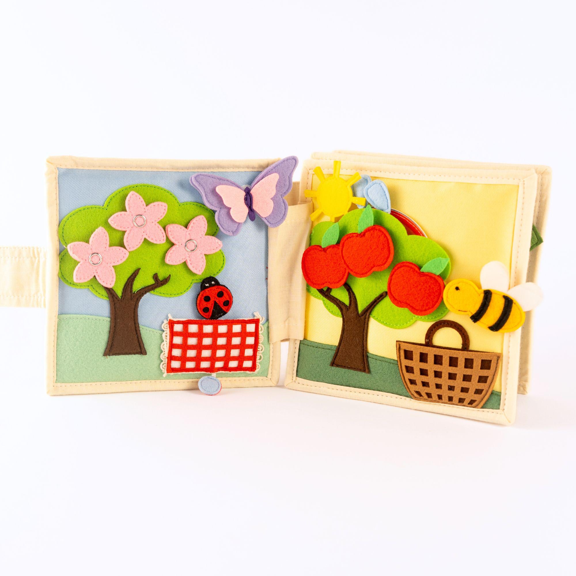 Mini Quiet Book Schneeflocke bis Sonnenschein Stoffbuch zum Anziehen, Jahreszeiten lernen & Selbstständigkeit fördern